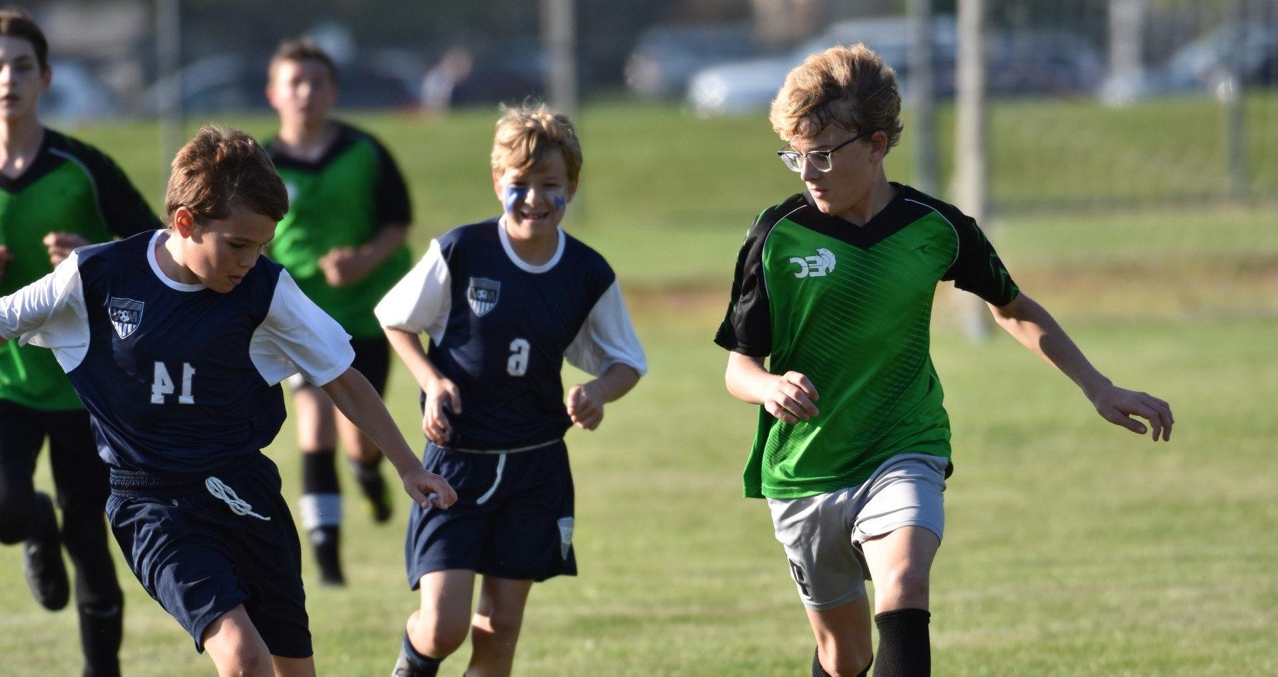 students playing soccer